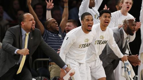 The Georgia Tech bench celebrates during its NIT semifinals win over Cal State Bakersfield in New York Tuesday night. (Associated Press)