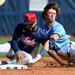 Atlanta Braves second baseman Leury García collides with Tampa Bay Rays' Carson Williams after tagging out during the seventh inning of a spring training baseball game at Charlotte Sports Park, Saturday, Feb. 24, 2024, in Port Charlotte, Fla. (Hyosub Shin / Hyosub.Shin@ajc.com)