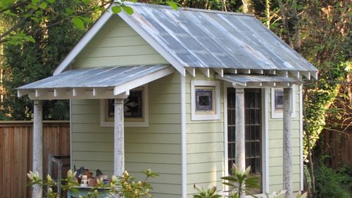 Jennifer Lauren and her husband, Rick Myers, built a shed with old tin and salvaged wood they bought from dealers at the Scott Antique Markets. Ben Jackson