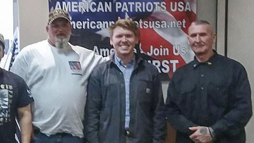 Georgia state Rep. Matt Gurtler (center), one of the leading candidate in the U.S. House seat being vacated by Doug Collins, attended an event sponsored by American Patriots USA, founded by Chester Doles (right). Doles is a Georgia man with longstanding ties to extremist groups. Michael Boggus (left), is a militia member and another candidate in the race.