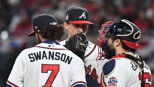 Kyle Wright and Dansby Swanson are among the Braves passionate about crossword puzzles. Hyosub Shin / Hyosub.Shin@ajc.com