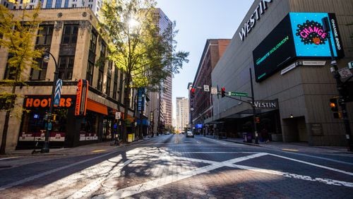 Atlanta is studying a major makeover of a portion of Peachtree Street, redesigning for more room for walkers and bikers. (Jenni Girtman for The Atlanta Journal-Constitution)