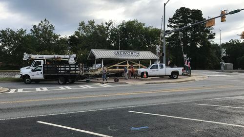 Acworth employees prepare to move the Open Air Acworth Depot Pavilion to the corner of Cowan and Cowan Connector. Courtesy of Acworth