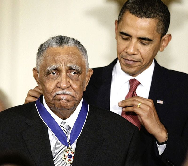 President Barack Obama presents a 2009 Presidential Medal of Freedom to Rev. Joseph Lowery who has been a leader of the civil rights movement since the 1950s, and co-founded the Southern Christian Leadership Conference with Martin Luther King, Wednesday.