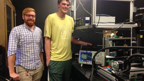 Georgia Tech center Ben Lammers has spent his summer in the school's Non-Destructive Evaluation Laboratory in an undergraduate research internship. His research has been led by Tech Ph.D candidate David Torello, to Lammers' left.