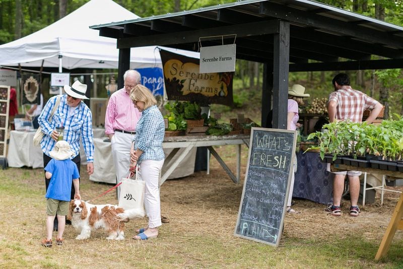 The Saturday morning Serenbe Farmers Market is popular with visitors and residents both two- and four-legged. CONTRIBUTED BY SERENBE FARMERS MARKET