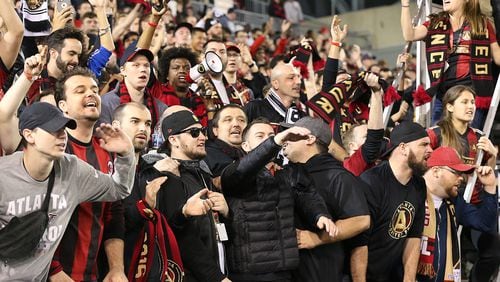 Atlanta United fans filled the stands to cheer on their team against the New York Red Bulls in the season-opener on Sunday, March 5. Curtis Compton/ccompton@ajc.com