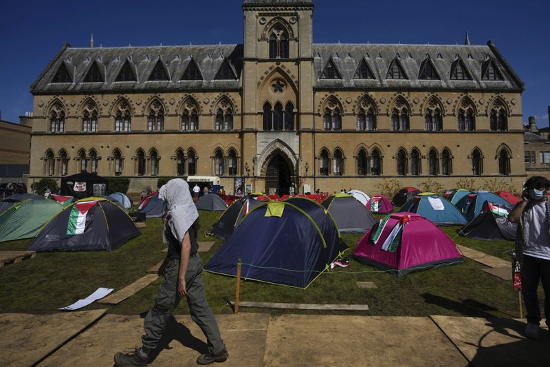 Pro-Palestinians students camps outside the Pitt Rivers Museum at Oxford, in England, Thursday, May 9, 2024. Students in the UK, including in Leeds, Newcastle and Bristol, have set up tents outside university buildings, replicating the nationwide campus demonstrations which began in the US last month. (AP Photo/Kin Cheung)
