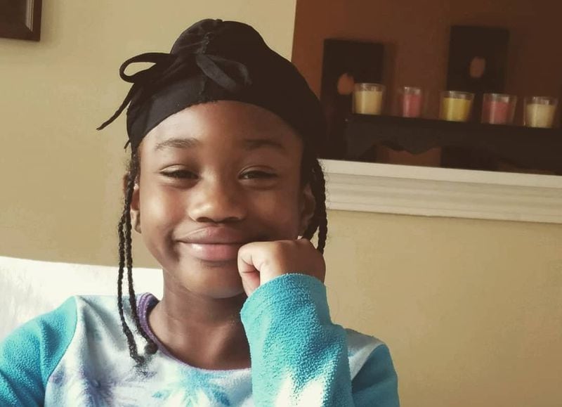 Mariasia Thomas, 7, died 10 days after being shot in the head at her home in DeKalb County. Three people have been charged with her murder. 