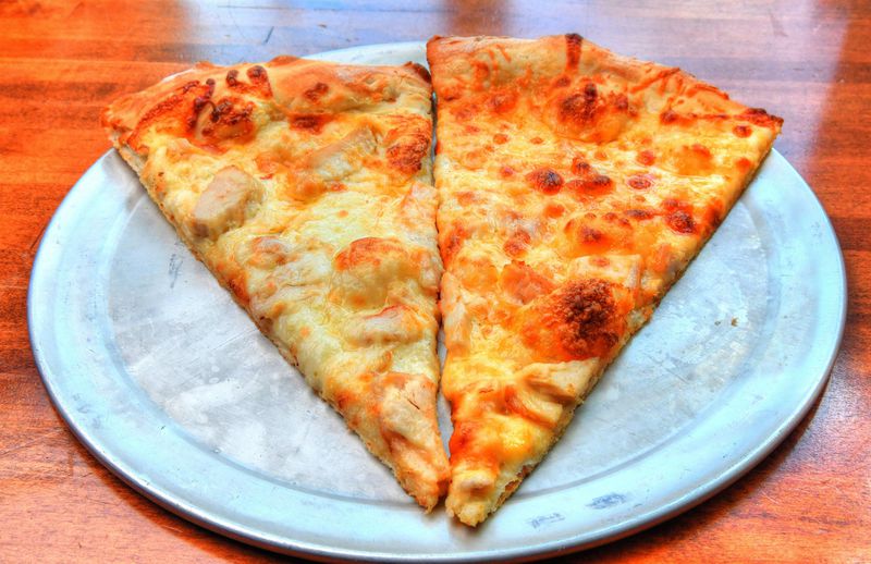 New York Style Chicken Alfredo Pizza slices. (Contributed by Chris Hunt Photography)