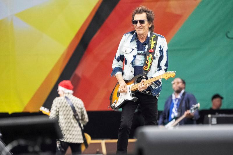 Ron Wood, of the Rolling Stones, performs during the New Orleans Jazz & Heritage Festival on Thursday, May 2nd, 2024, at the Fair Grounds Race Course in New Orleans. (Photo by Amy Harris/Invision/AP)