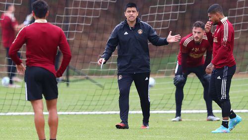 Atlanta United manager Gonzalo Pineda works with players during team practice Wednesday, Feb. 23, 2022, in Marietta.  “Curtis Compton / Curtis.Compton@ajc.com”`