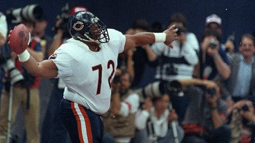 Chicago Bears' William "The Refrigerator" Perry spikes the ball after scoring a touchdown in Super Bowl XX in New Orleans, La., on Jan. 26, 1986.  The Bears won 46-10, scoring the most points in Super Bowl history.  (AP Photo/Amy Sancetta)