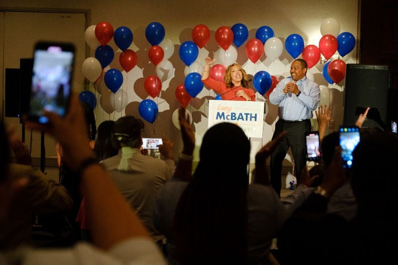 U.S. Rep. Lucy McBath celebrates with her husband, Curtis McBath, at her primary election night party in May at the Hilton Atlanta Northeast. McBath won a three-way Democratic primary after moving into Georgia’s 7th Congressional District after the GOP-controlled General Assembly redrew her 6th Congressional District to make it more Republican-friendly. (Arvin Temkar / arvin.temkar@ajc.com)