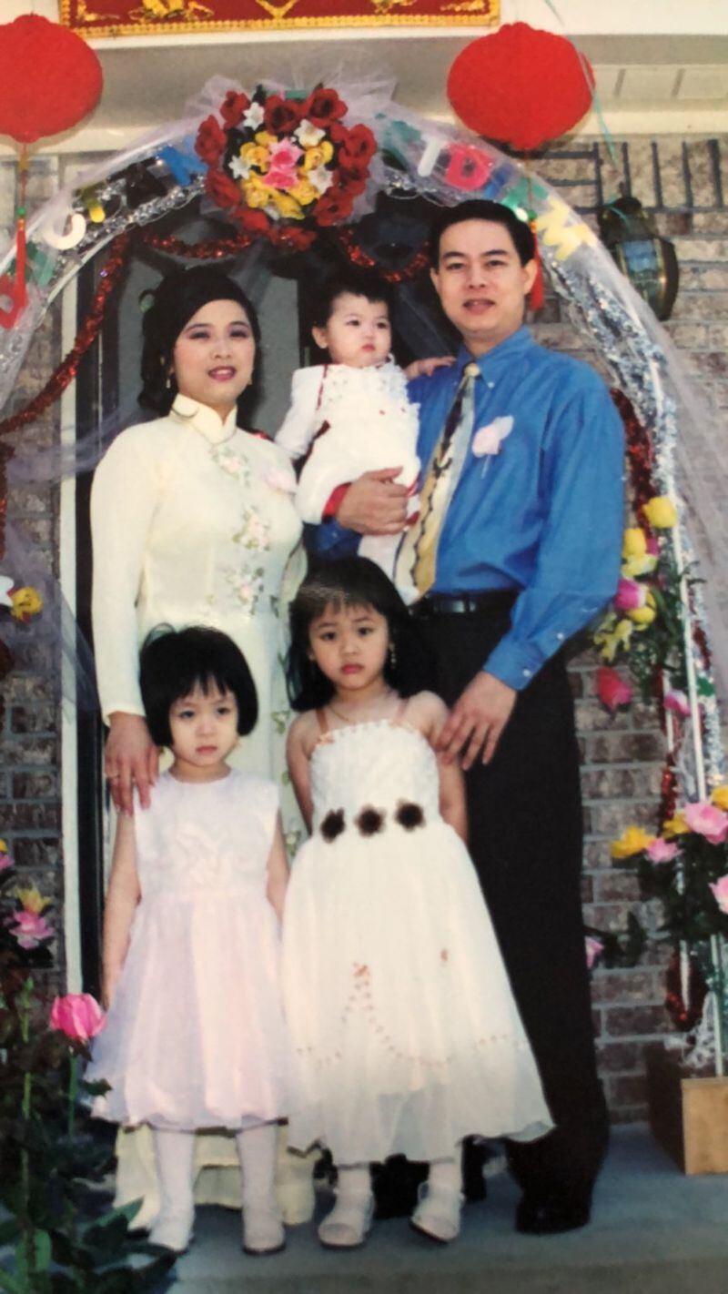 Christie (lower left) is pictured with her parents and sisters at 4 or 5 years old. CONTRIBUTED