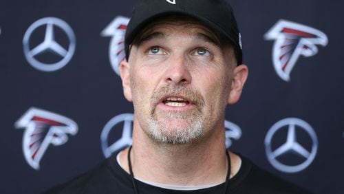 June 13, 2017, Flowery Branch: Falcons head coach Dan Quinn is looking up as he sums up the first day of mini-camp on Tuesday, June 13, 2017, in Flowery Branch. Curtis Compton/ccompton@ajc.com