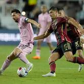 Atlanta United midfielder Santiago Sosa (5) defends Inter Miami forward Lionel Messi (10) during the second half of a Leagues Cup soccer match, Tuesday, July 25, 2023, in Fort Lauderdale, Fla. (AP Photo/Lynne Sladky)