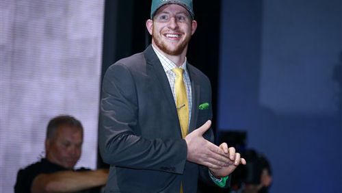 North Dakota State�s Carson Wentz walks on the stage after being selected by Philadelphia Eagles as second pick in the first round of the 2016 NFL football draft, Thursday, April 28, 2016, in Chicago. (Jeff Haynes/AP Images for Panini)
