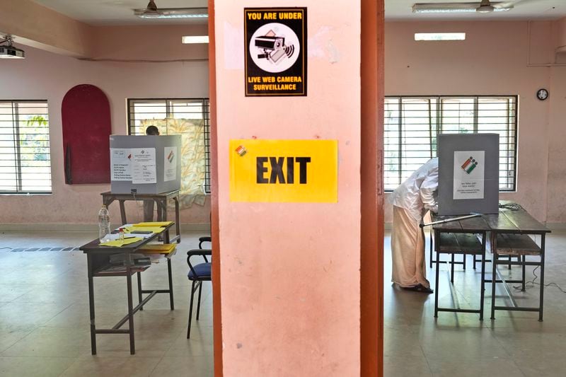 People vote during the second phase of national election in Palakkad, Kerala, India, Friday, April 26, 2024. (AP Photo/Manish Swarup)