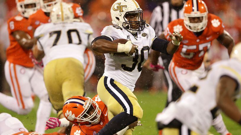 KirVonte Benson of the Georgia Tech Yellow Jackets runs with the ball against the Clemson Tigers during their game at Memorial Stadium on October 28, 2017 in Clemson, South Carolina.  (Photo by Streeter Lecka/Getty Images)