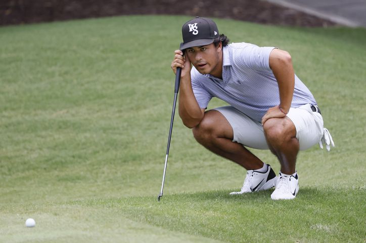Scotty Kennon, Wake Forest University, who finished second, lines up his putt on the seventh green during the final round of the Dogwood Invitational Golf Tournament in Atlanta on Saturday, June 11, 2022.   (Bob Andres for the Atlanta Journal Constitution)