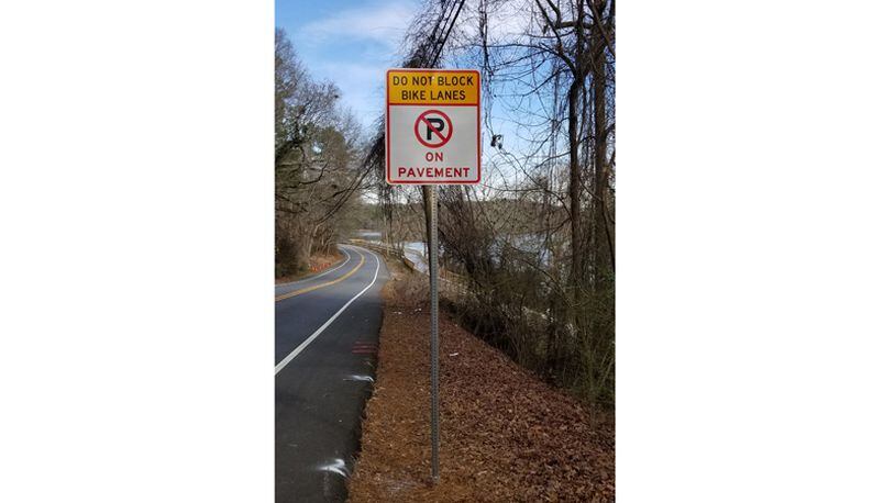 The warning signs are going up, and the last week of February, Roswell is expected to begin ticketing drivers who park illegally across bike lanes and within travel lanes along the Chattahoochee River. CITY OF ROSWELL