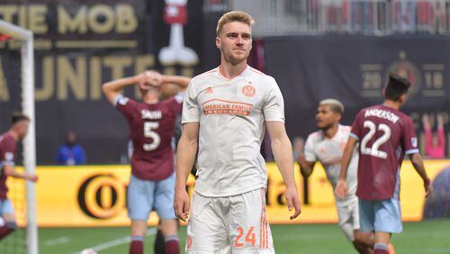 Atlanta United defender Julian Gressel (24) reacts after scoring a goal assisted by Atlanta United defender Leandro Gonzalez (5) during the second half in a MLS soccer match at Mercedes-Benz Stadium in Atlanta on Saturday, April 27, 2019. Atlanta United won 1-0 over the Colorado Rapids. HYOSUB SHIN / HSHIN@AJC.COM
