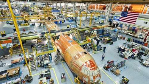 The production line for the C-130J Super Hercules aircraft at the Lockheed Martin plant in Cobb County. President Donald Trump announced he will reduce funding as part of a shift of $3.8 billion in defense funding to build the border wall. Photo: Lockheed Martin