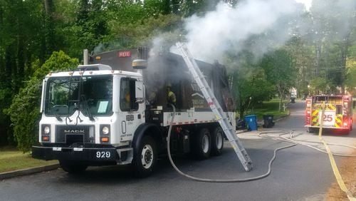 A garbage truck caught fire in Gwinnett County on Monday morning.