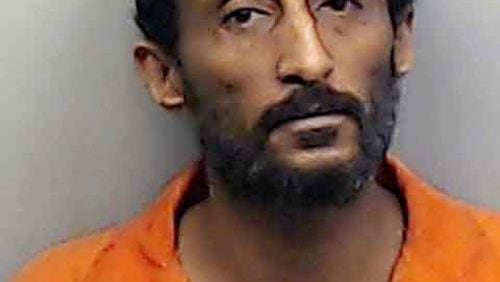 Amanuel Menghesha, 42, of Fairburn, was booked into the Fulton County jail Friday after spending more than two weeks in Grady Memorial Hospital. (Photo: Fulton County Sheriff’s Office)