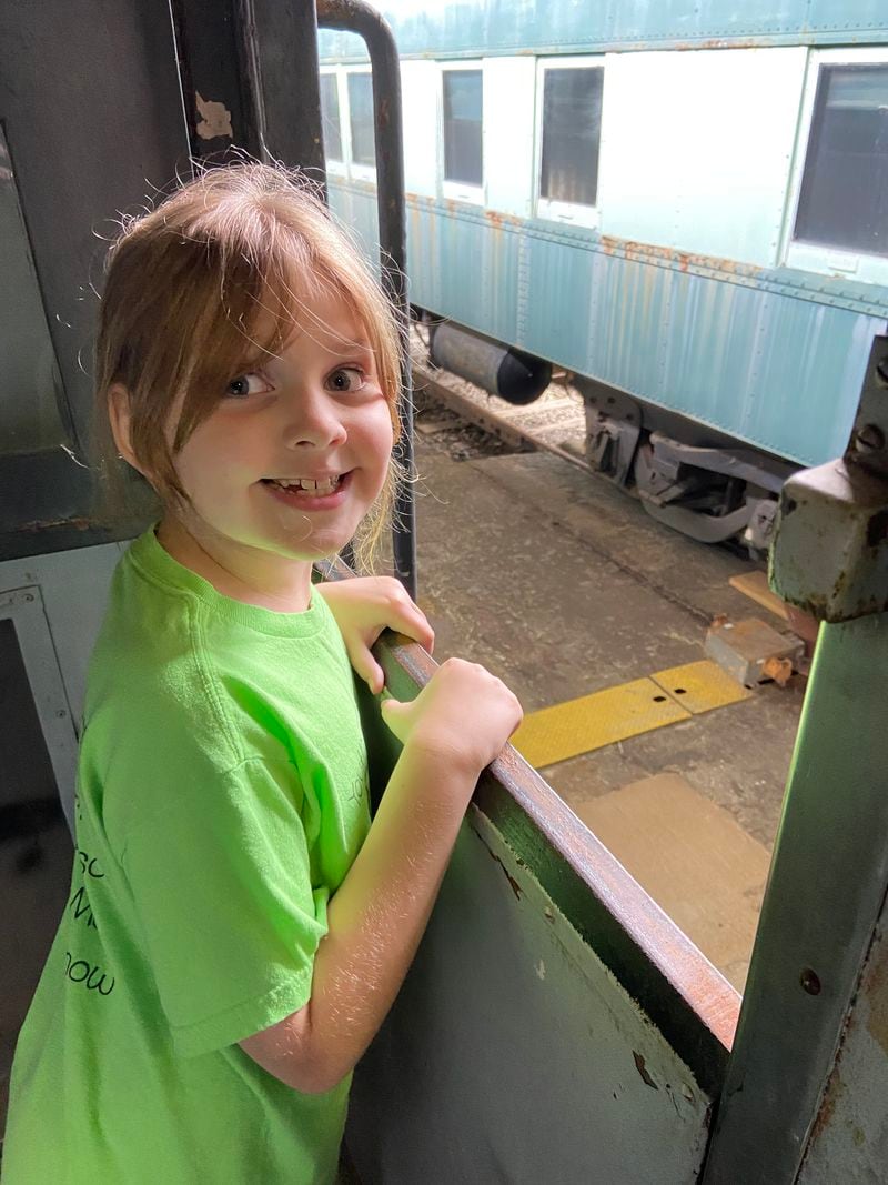 Reagan Snow, 9, of Loganville, loves trains. She was selected to give public announcements for MARTA's transit autism awareness project. Courtesy of Samantha Snow