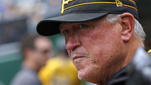 Pittsburgh Pirates manager Clint Hurdle stands in the dugout during a baseball game against the Cincinnati Reds in Pittsburgh, Sunday, Sept. 3, 2017. (AP Photo/Gene J. Puskar)