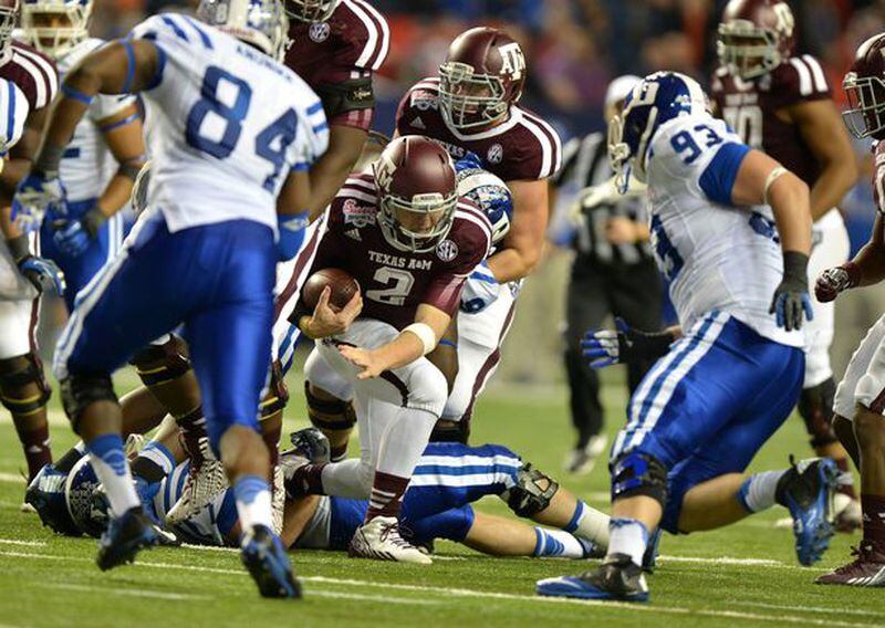 This was the play where Johnny Football bounced, ran and threw. (Brant Sanderlin/AJC photo)