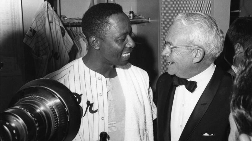 When the Braves won their first NL West title in 1969, Atlanta Mayor Ivan Allen Jr. celebrated with future home run king Hank Aaron.