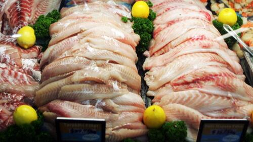 Fresh fish is displayed at a seafood market in New Zealand. A new study finds eating more fish can help reduce the painful symptoms of rheumatoid arthritis.