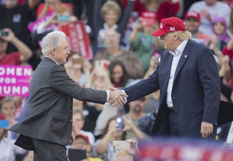  President Donald Trump greeted U.S. Sen. Jeff Sessions during a victory rally in Mobile, Alabama, in December. (AP photo)