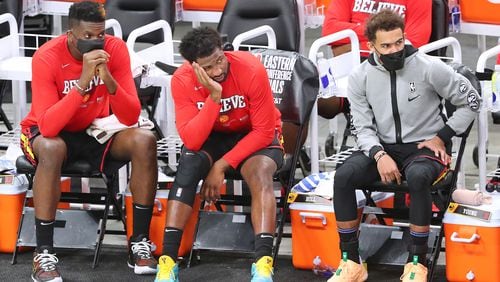 Clint Capela (from left), Solomon Hill and Trae Young watch from the bench in the final minutes of a 125-91 loss to the Milwaukee Bucks during game 2 in the NBA Eastern Conference Finals to even the series 1-1 on Friday, June 25, 2021, in Milwaukee.