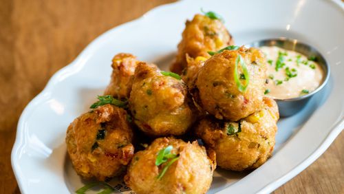 At Achie’s, Lowcountry Frogmore Fritters are an appetizer you can share, but we don’t blame you if you want to keep them for yourself. CONTRIBUTED BY HENRI HOLLIS