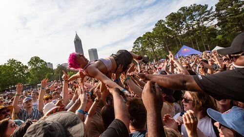 Crowd-surfing is always part of the fun at Shaky Knees, as you can see from this shot from the festival on Friday May 3, 2024 at Central Park, Old Fourth Ward.(RYAN FLEISHER FOR THE ATLANTA JOURNAL-CONSTITUTION)