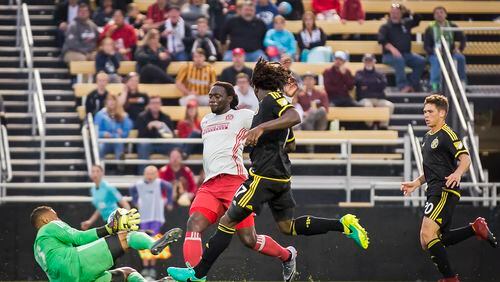 Charleston, South Carolina -  February 18, 2017:United's Kenwyne Jones (#9) is only a couple steps too slow to capitalize against the Columbus Crew on Saturday, Feb. 18, 2017 in Charleston. (Photo by Alex Holt)