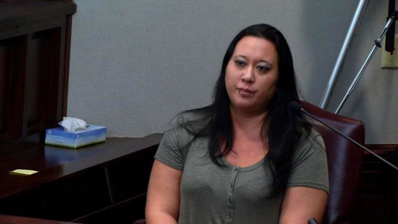 Angela Cornett, who says that she chatted with Justin Ross Harris on the app Scout in 2014, testifies during Harris' murder trial at the Glynn County Courthouse in Brunswick, Ga., on Thursday, Oct. 27, 2016. Cornett said that Harris engaged in sexual talk with her on the apps Scout and Kik, and that he said the he wanted to sleep with as many women as possible in his lifetime. (screen capture via WSB-TV)