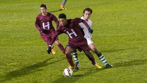 Andrew Wheeler-Ominu is shown in this photo playing for Harvard. (Robert F Worley)