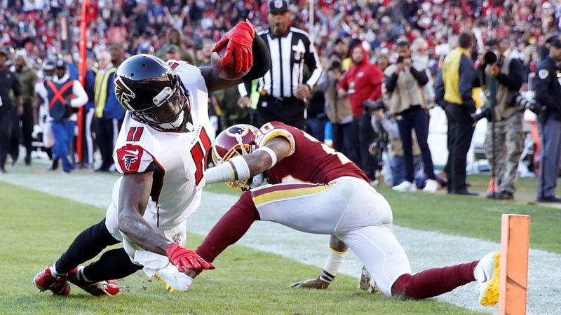 In 2017, fantasy sports was a $7.2 billion industry with almost 60 million players in the U.S. and Canada. Julio Jones of the Atlanta Falcons, a top draft pick for fantasy teams, dives into the end zone on November 4 in Landover, Maryland. (Photo by Joe Robbins/Getty Images)