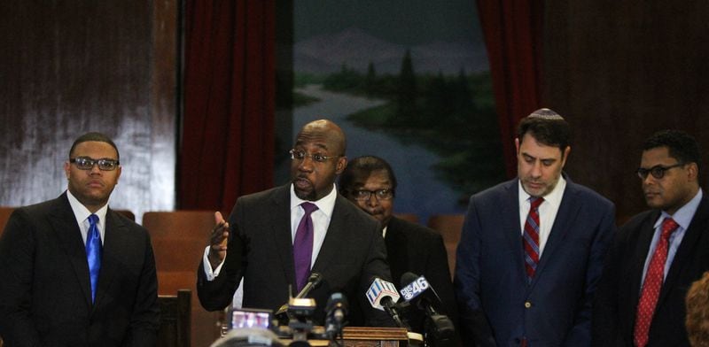 The Rev. Raphael G. Warnock, senior pastor at Ebenezer Baptist Church in Atlanta, addresses the public, along with other Atlanta clergy, to condemn the “vile and racist” remarks made by President Donald Trump at the historic pulpit in Ebenezer Baptist Church in Atlanta. (REANN HUBER/REANN.HUBER@AJC.COM)