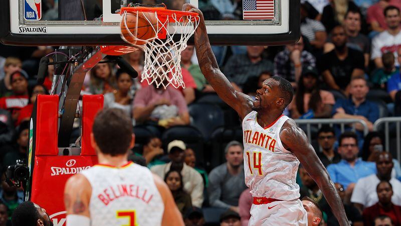 ATLANTA, GA - NOVEMBER 06:  Dewayne Dedmon #14 of the Atlanta Hawks dunks against the Boston Celtics at Philips Arena on November 6, 2017 in Atlanta, Georgia.  NOTE TO USER: User expressly acknowledges and agrees that, by downloading and or using this photograph, User is consenting to the terms and conditions of the Getty Images License Agreement.  (Photo by Kevin C. Cox/Getty Images)