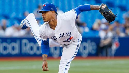Toronto pitcher Marcus Stroman throws against the Cleveland Indians in the third inning July 24, 2019, at the Rogers Centre in Toronto.