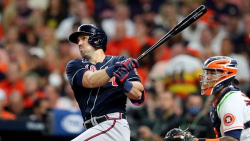 Braves center fielder Adam Duvall hits a two-run home run during the third inning against the Houston Astros in game 1 of the World Series at Minute Maid Park, Tuesday October 26, 2021, in Houston, Tx. Curtis Compton / curtis.compton@ajc.com