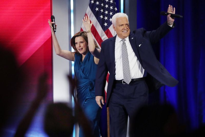 Mercedes and Matt Schlapp walk onstage to a cheering crowd during CPAC at the Hyatt Regency in Orlando, Florida on Feb. 28, 2021. Earlier this year, a former campaign aide to U.S. Senate candidate Herschel Walker alleged that Matt Schlapp, the chairman of the political organization that hosts CPAC, groped him during a campaign visit to Georgia. (Stephen M. Dowell/Orlando Sentinel/TNS)