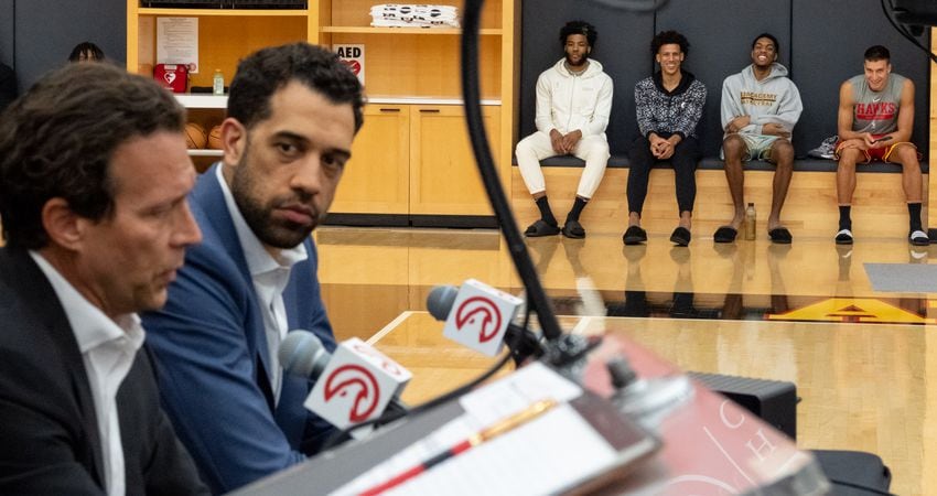 230227-Brookhaven-Hawks players Saddiq Bey, from left, Jalen Johnson, Trent Forrest, and Bogdan Bogdanovic listen as new Hawks Head Coach Quin Snyder and General Manager Landry Fields hold a press conference Monday afternoon, Feb. 27, 2023. Ben Gray for the Atlanta Journal-Constitution