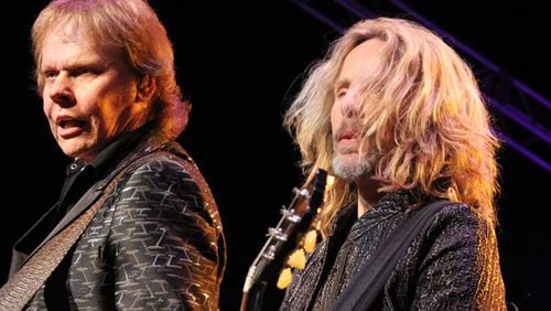 Tommy Shaw (right, with James "J.Y." Young in Atlanta last summer) says fans will hear five selections from the new album, "The Mission." Photo: Melissa Ruggieri/AJC